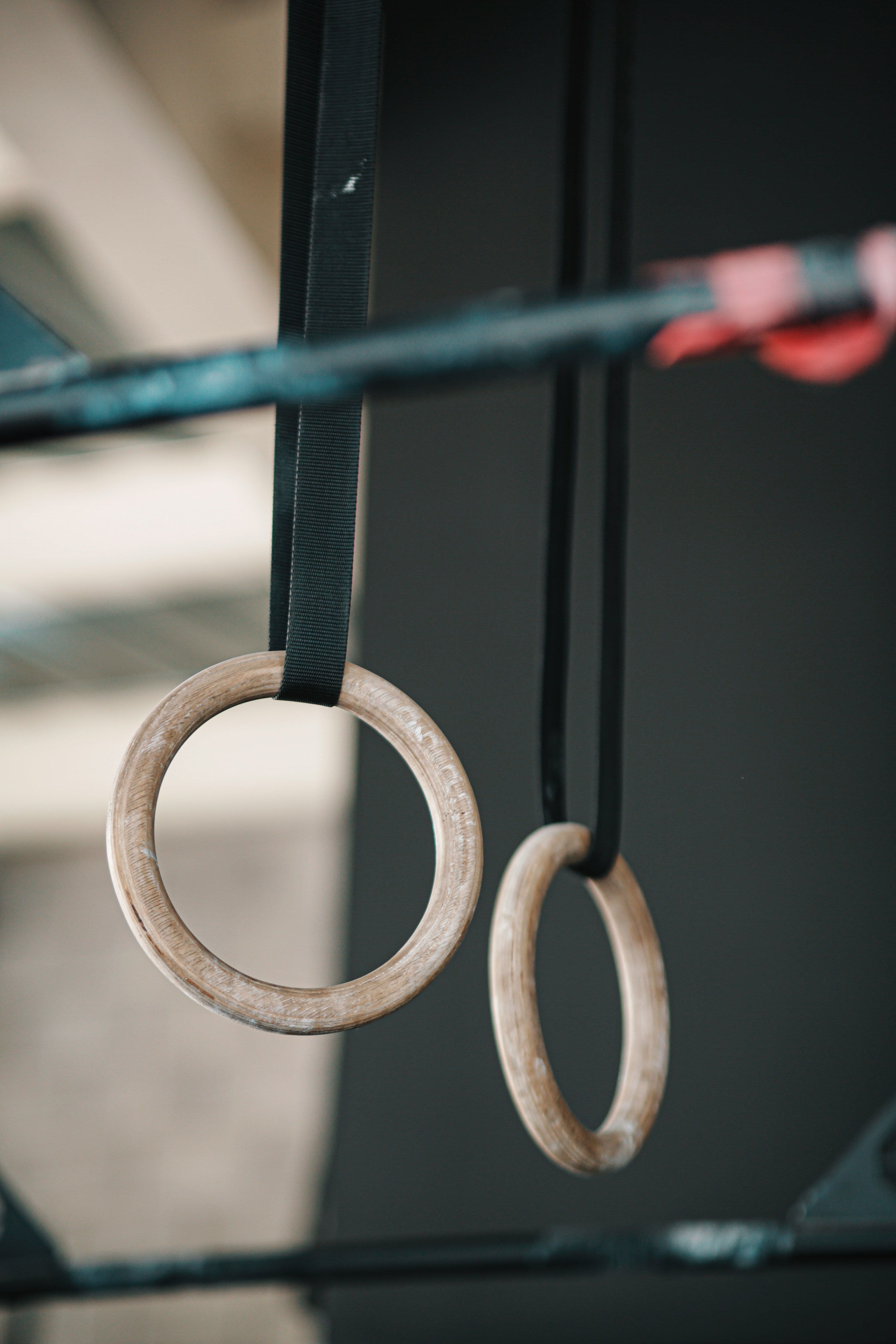 Gymnastic rings hanging in the Airborne studio